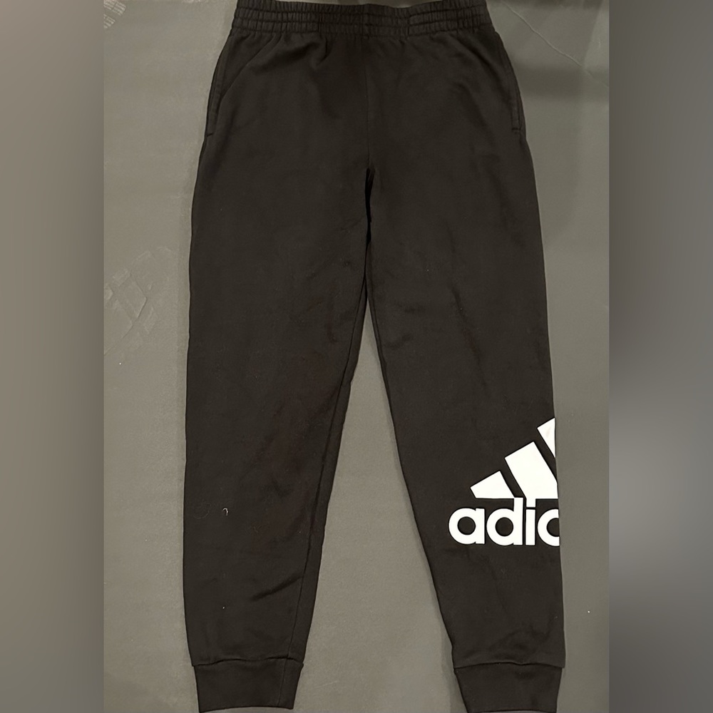 Black adidas’s sweat pants